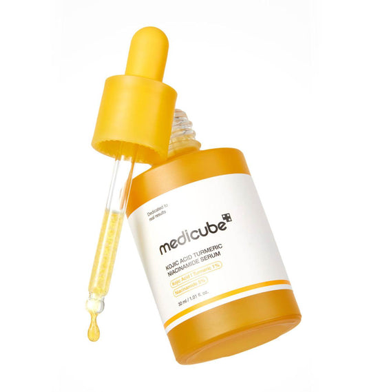 Medicube Kojic Acid Tumeric Niacinamide Serum 30ml bottle, clear serum with a pump dispenser for brightening and skin tone improvement.