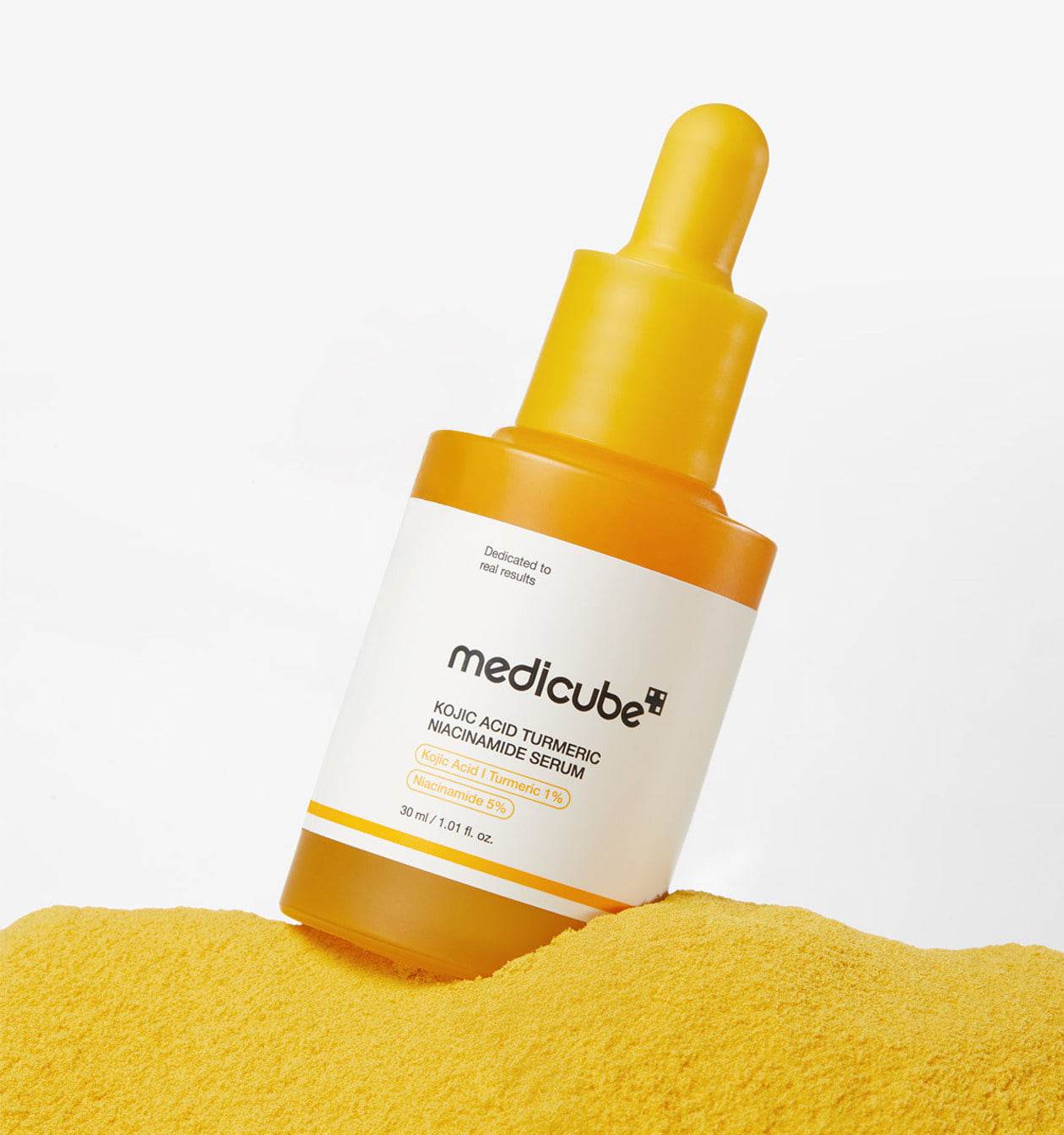 Medicube Kojic Acid Tumeric Niacinamide Serum 30ml bottle, clear glass container with dropper for skin brightening and hydration.