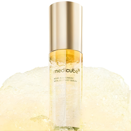 Medicube Kojic Acid Turmeric Vita Jelly Mist Serum bottle, 100 ml, with a clear label and spray nozzle, on a white background.