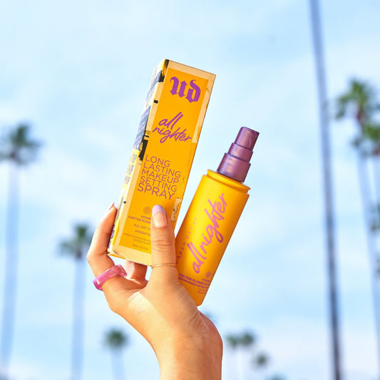 Urban Decay All Nighter long-lasting makeup setting spray with vitamin C in a sleek spray bottle.