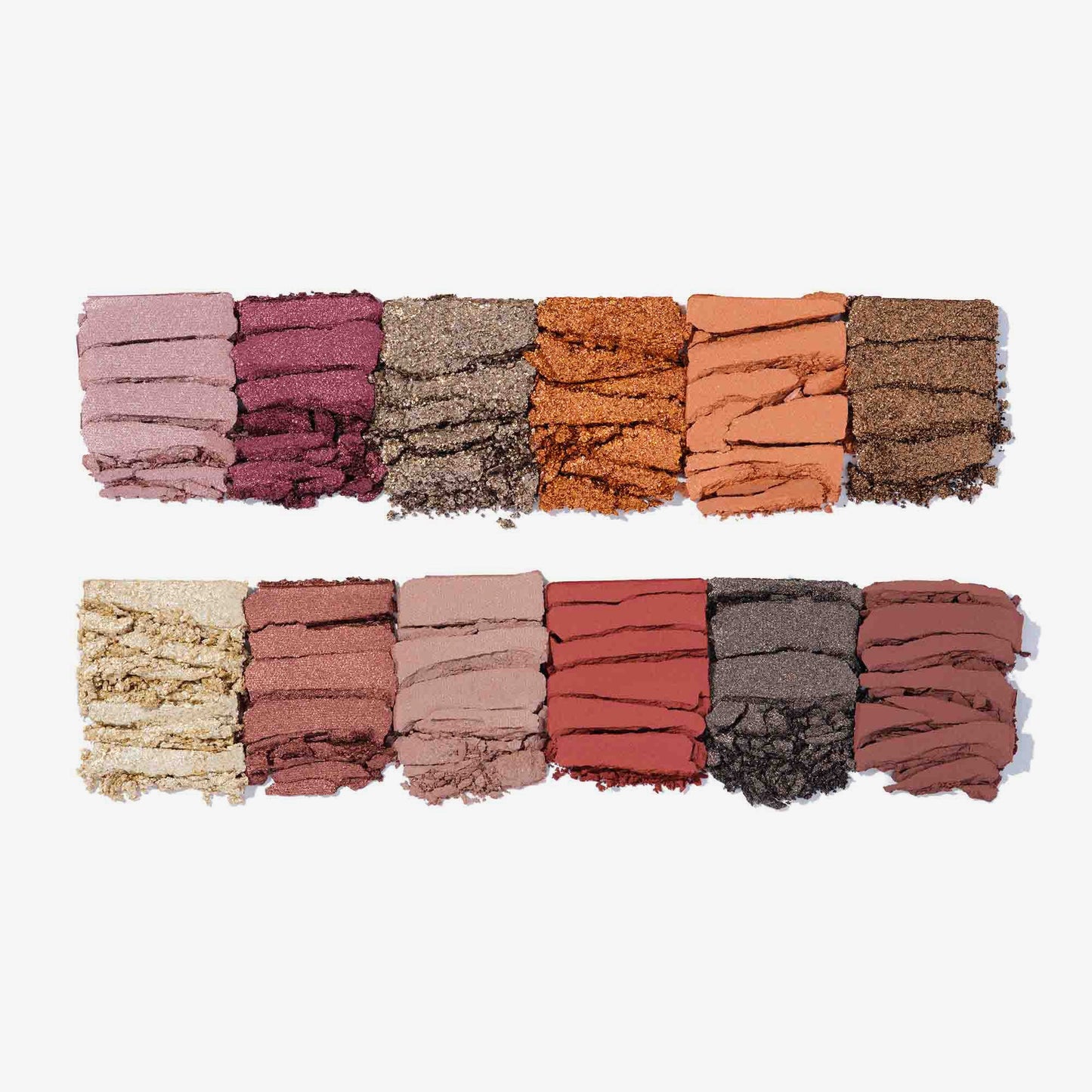 Anastasia Beverly Hills Rose Metals Palette with face highlighter and eyeshadow swatches in warm metallic shades on a neutral background.