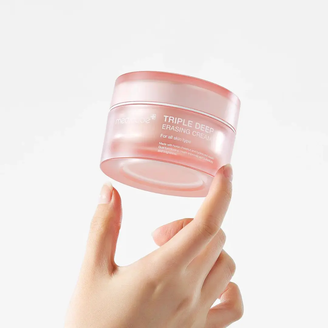 Medicure Triple Collagen Cream 50 ml jar showing creamy texture and product label for skin hydration and anti-aging.