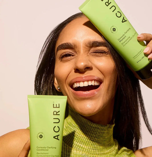 ACURE Curiously Clarifying Shampoo and Conditioner Set bundle showing bottles with label details.