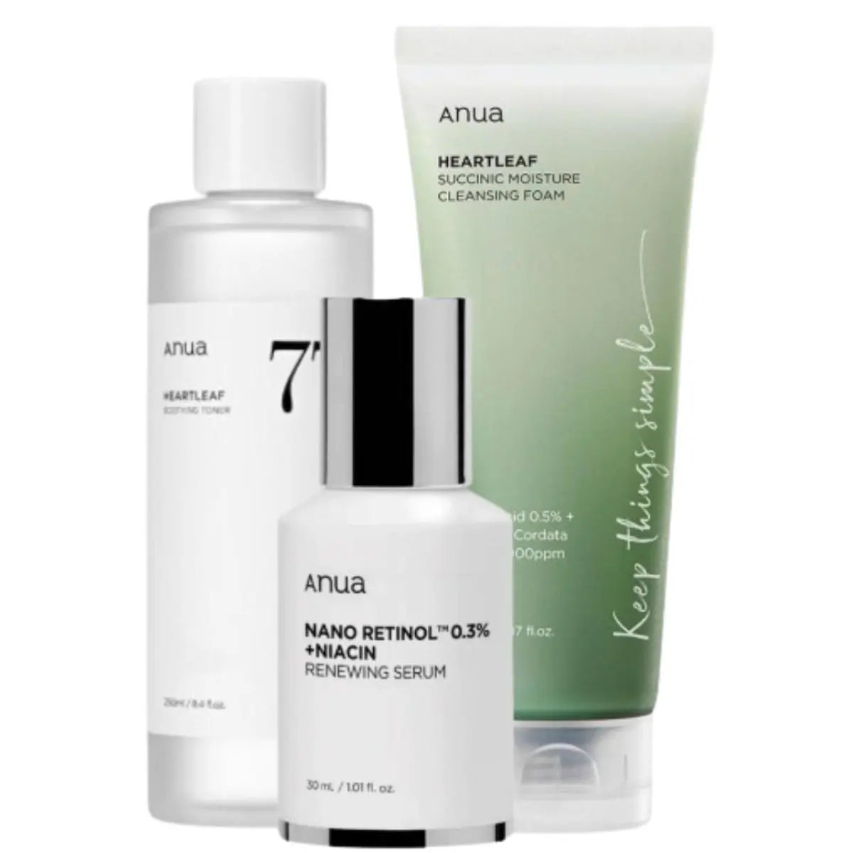 Anua Renewing Serum, Toner, and Cleansing Foam set with skincare products displayed on a clean surface.
