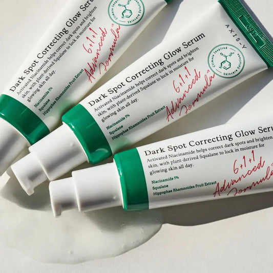 AXIS-Y Dark Spot Correcting Glow Serum 50ml bottle with dropper, featuring sleek packaging and clear labeling.