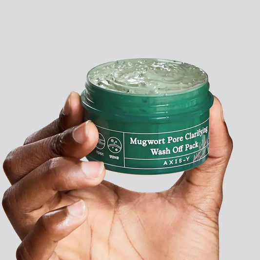 AXIS-Y Mugwort Pore Clarifying Wash Off Pack in a 100 ml jar, featuring a white lid and minimalist label design.