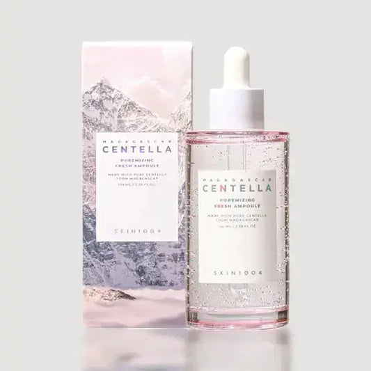 SKIN1004 Madagascar Poremizing Fresh Ampoule 100 ml, clear glass bottle with dropper for skincare treatment.