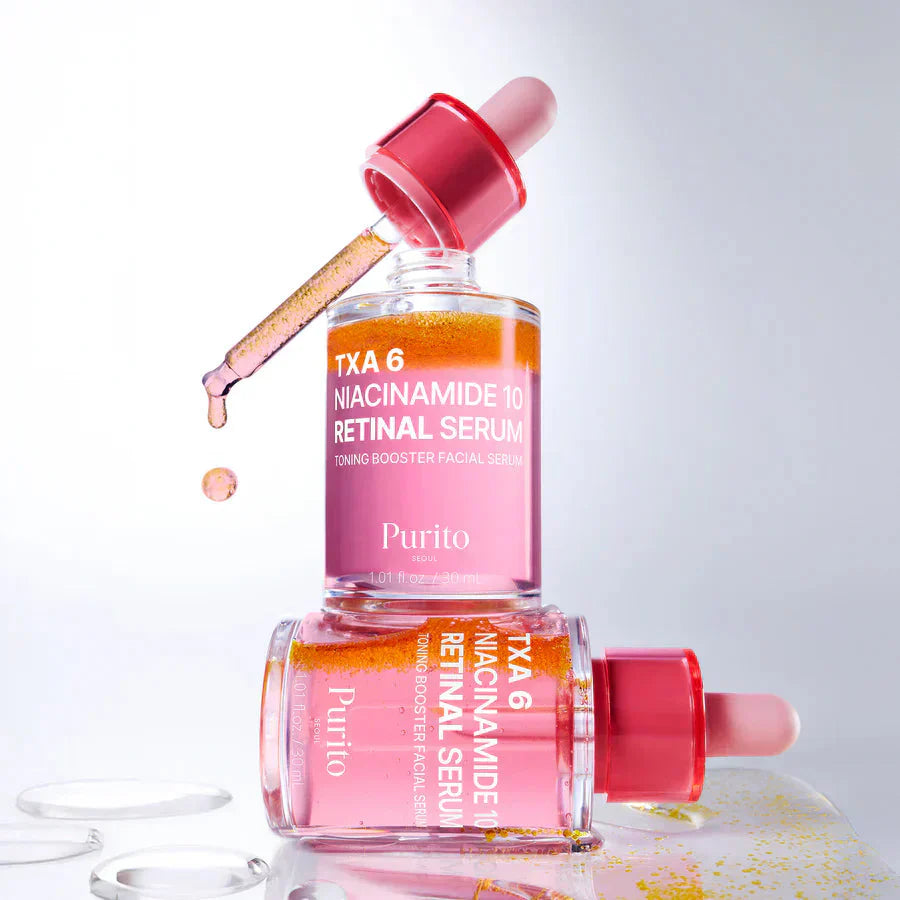 Purito Seoul TXA 6 Niacinamide Retinal Serum 30ml bottle with pump, shown on a clean white surface.