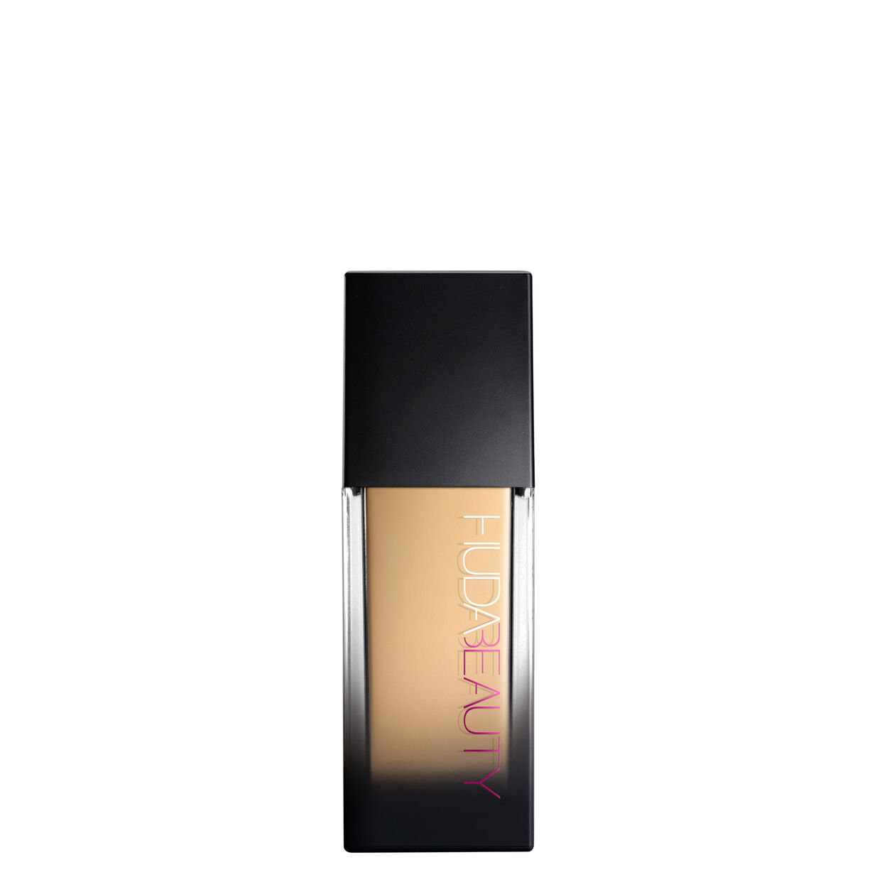 Huda Beauty FauxFilter Luminous Matte Foundation in Creme Brulee, showing the foundation bottle with product label and packaging.
