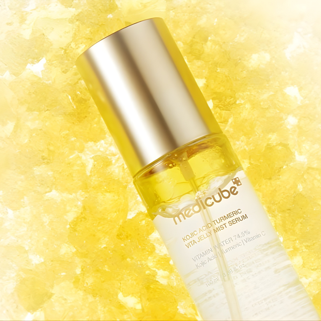 Medicube Kojic Acid Turmeric Vita Jelly Mist Serum in a 100ml bottle, featuring a clear, vibrant liquid inside a sleek bottle.