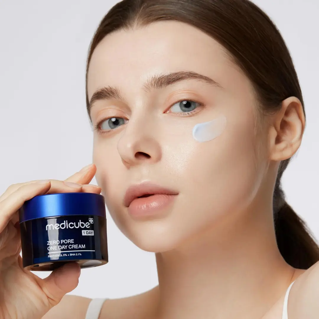 Medicube Zero Pore One Day Cream 50ml jar with white and blue packaging, visible cream texture, and product label.