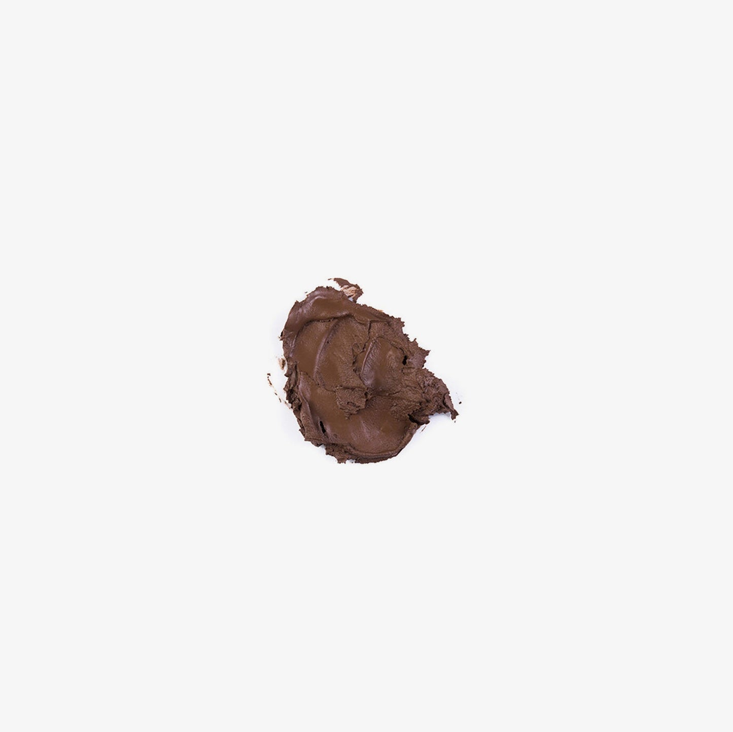 Swatch of Anastasia Beverly Hills DIPBROW® Pomade in Chocolate showing creamy brow color and texture on a neutral background.