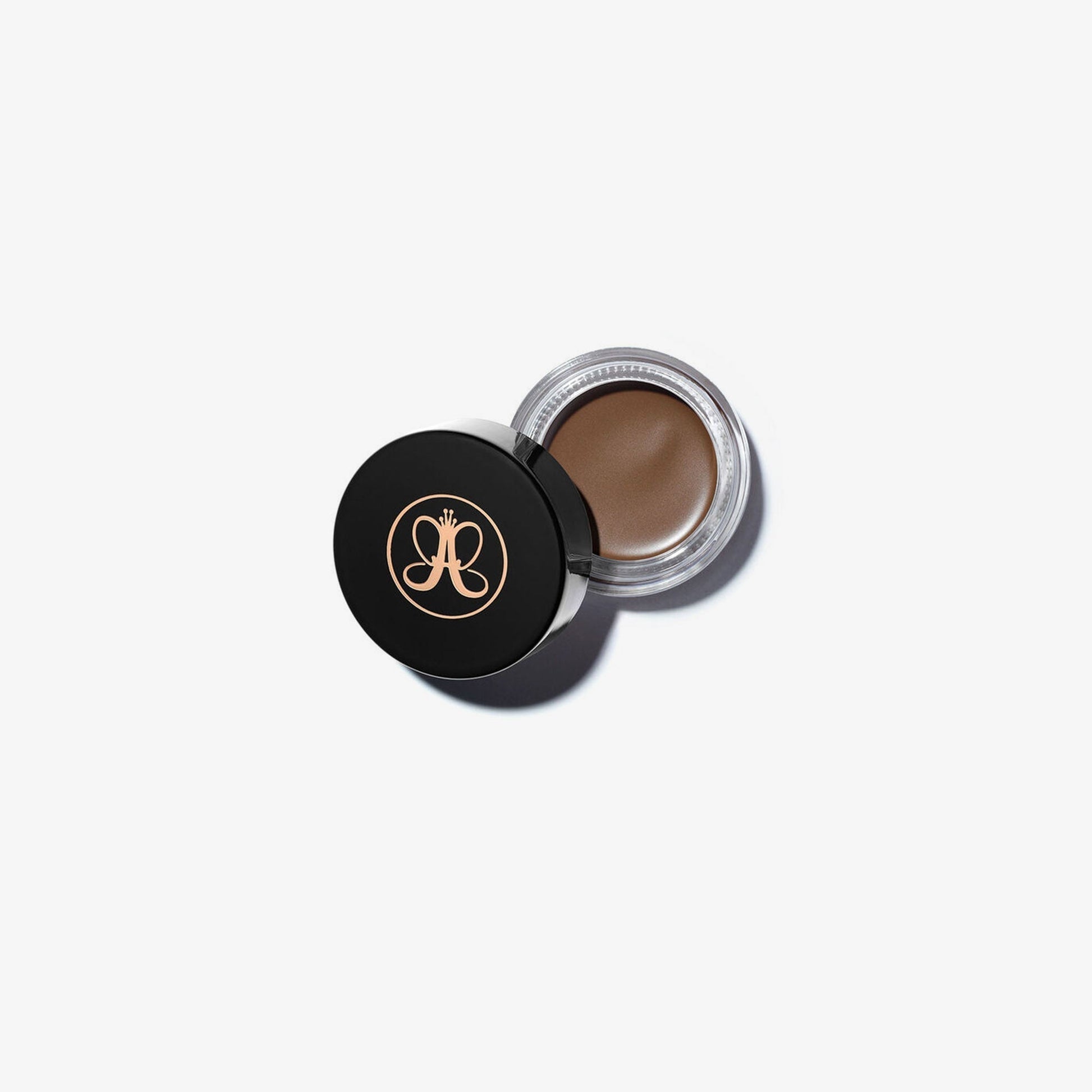 Anastasia Beverly Hills DIPBROW Pomade in Caramel, creamy brow color in a compact jar for shaping and defining eyebrows.
