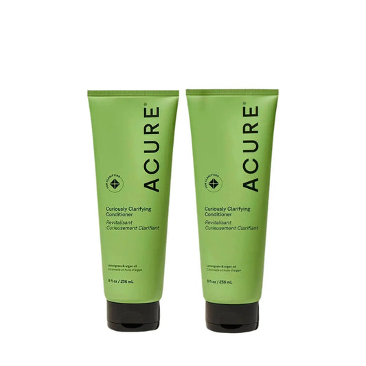 ACURE Curiously Clarifying Shampoo and Conditioner set, natural hair care products, in a matching bundle with bottles visible.