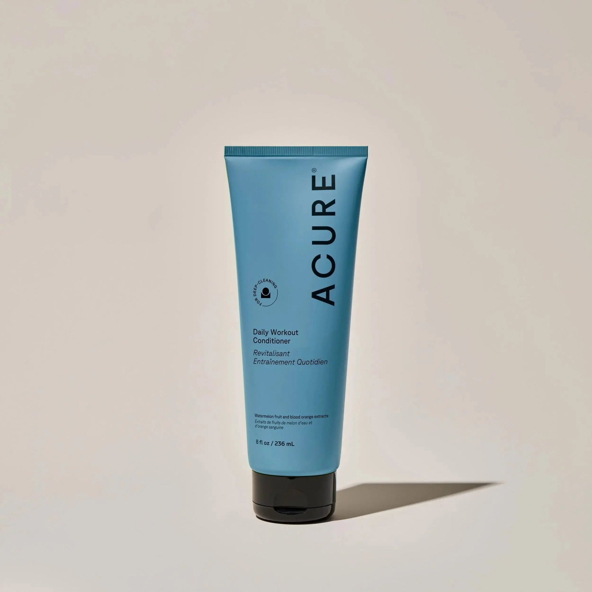 ACURE Daily Workout Shampoo and Conditioner bundle featuring natural hair care products with invigorating formulas.