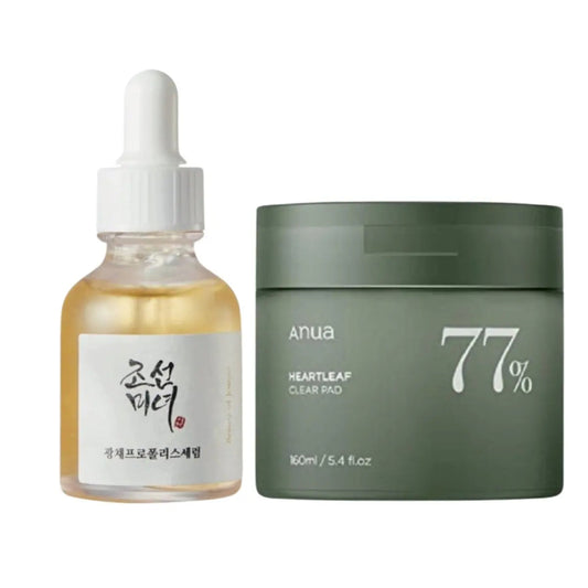 ANUA Heartleaf 77 Clear Pad and Beauty of Joseon serum set with skincare products and packaging on a neutral background.