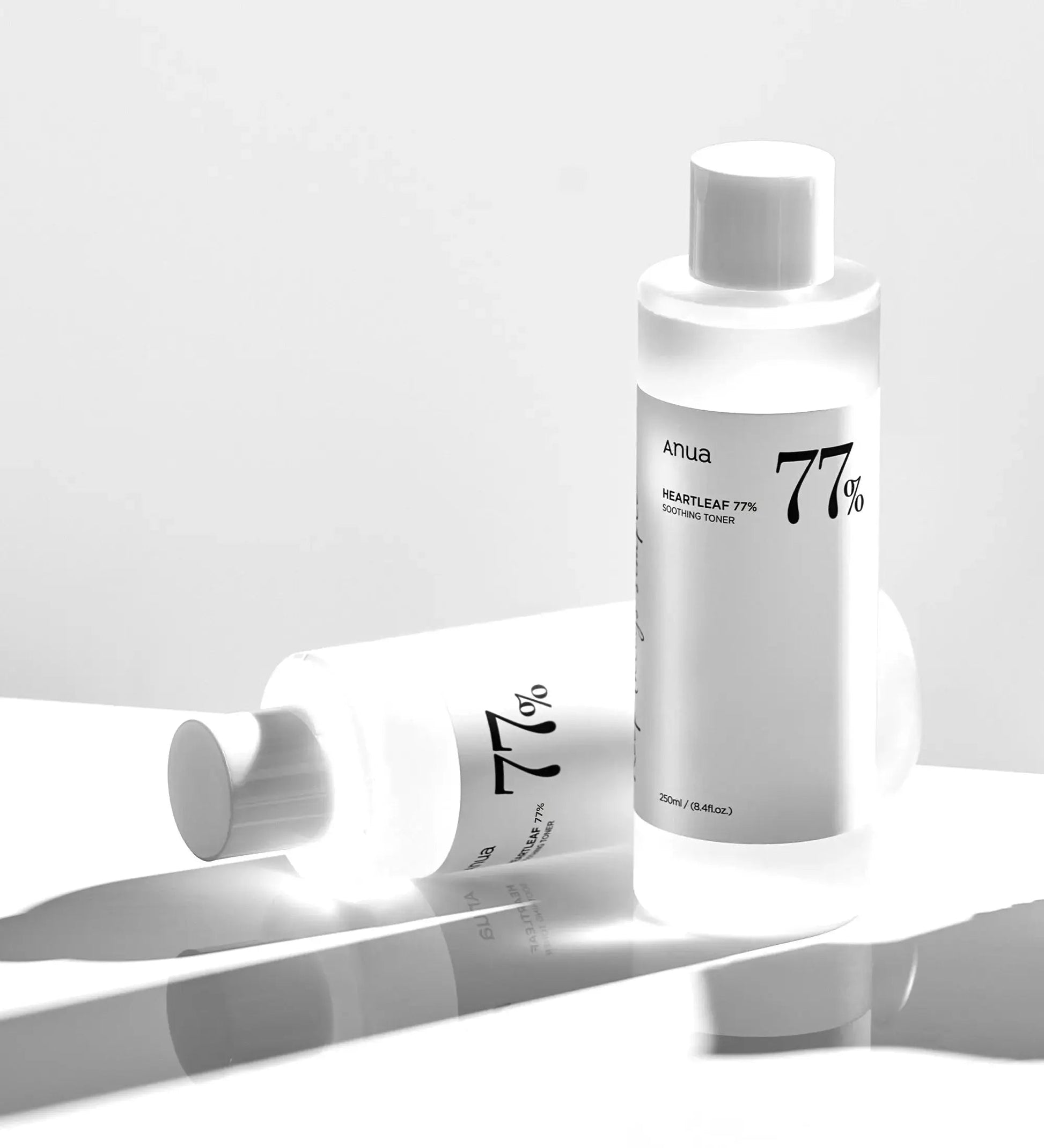 Anua Heartleaf 77% Soothing Toner in a 250ml bottle, featuring a clear liquid and minimalist label design.