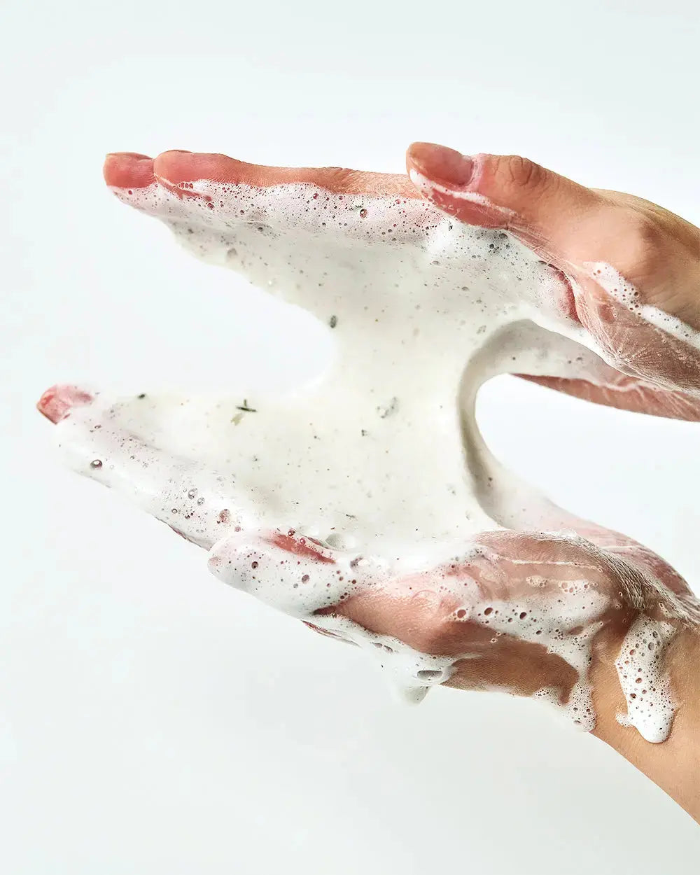 ANUA Heartleaf Quercetinol Pore Deep Cleansing Foam in 150ml bottle, showing the product with clean, foaming texture.
