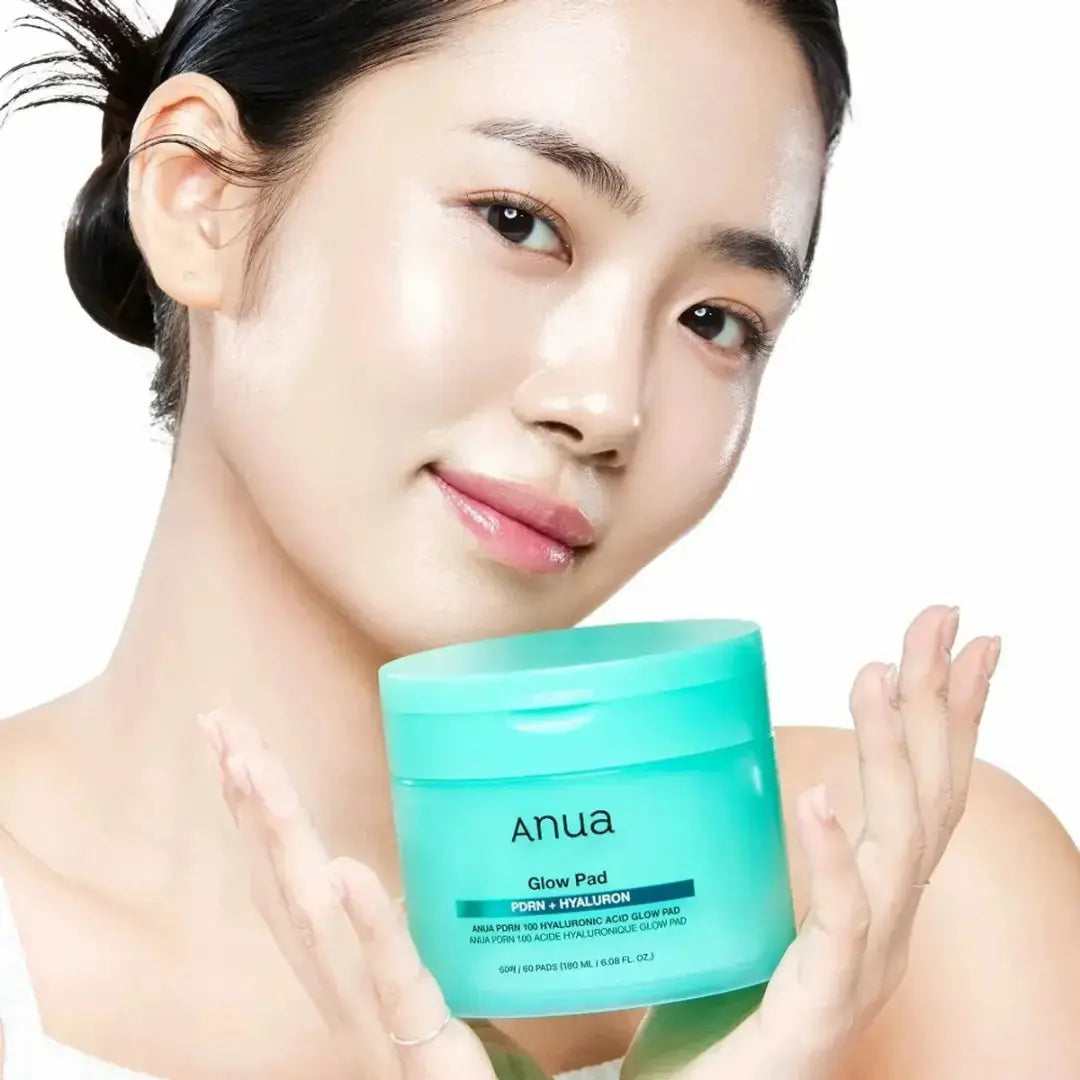 ANUA PDRN 100 Hyaluronic Acid Glow Pads, 60 soft, exfoliating skincare pads with hydrating and revitalizing ingredients.