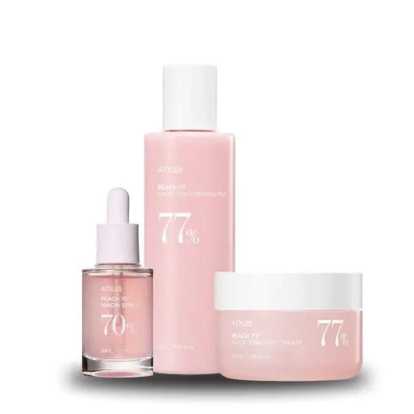 Anua Peach 77 Series skincare set with peach-themed bottles and jars, featuring cleansers, toners, and moisturizers.