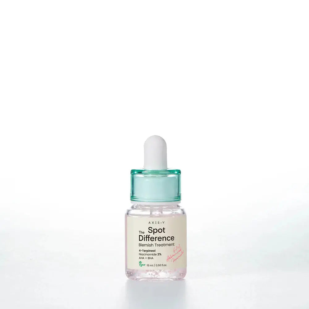 AXIS-Y Spot The Difference Blemish Treatment 15 ml bottle, clear skincare serum for blemish control and skin clarity.