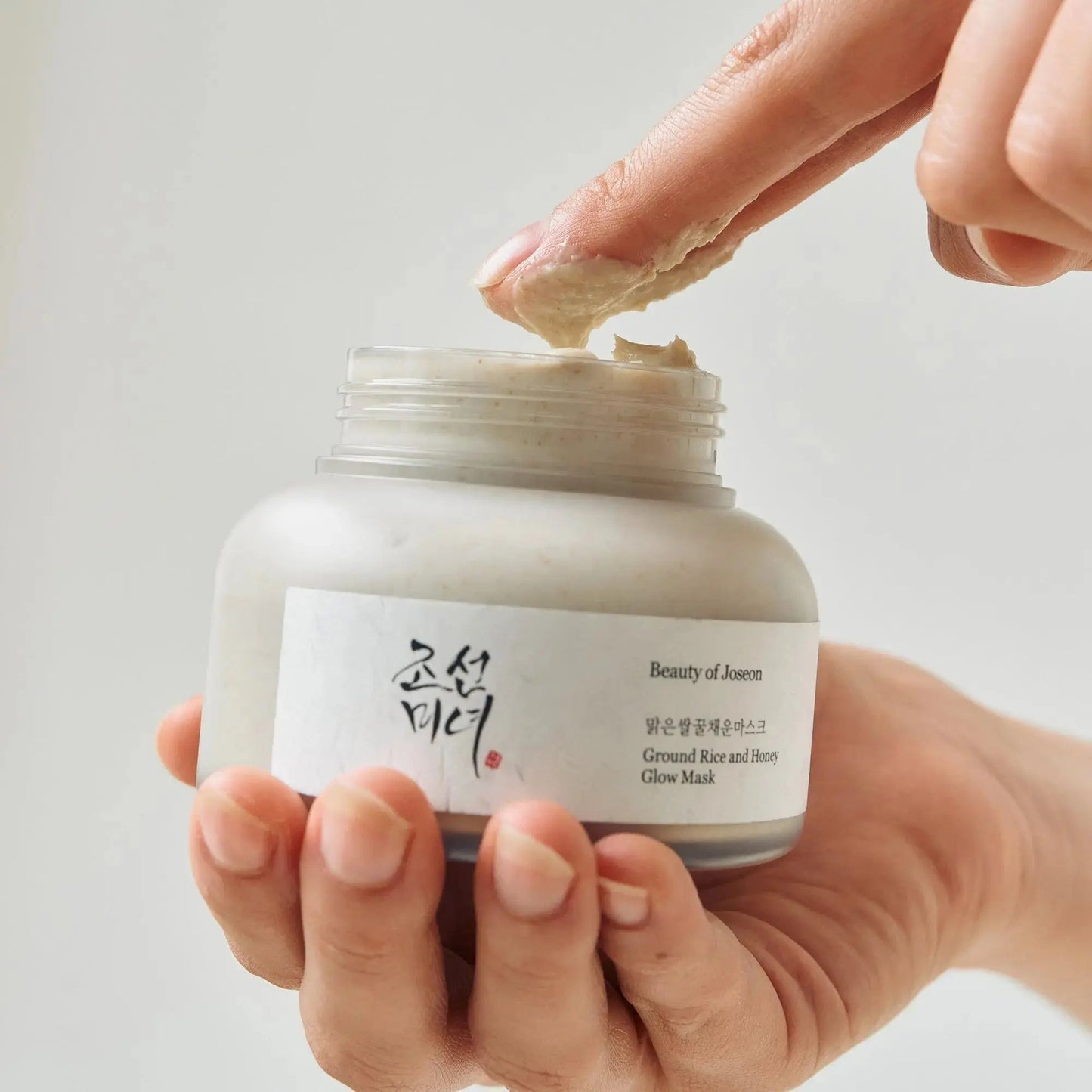 Beauty of Joseon Glow Charging Rice Duo Kit with skincare products in white and gold packaging.