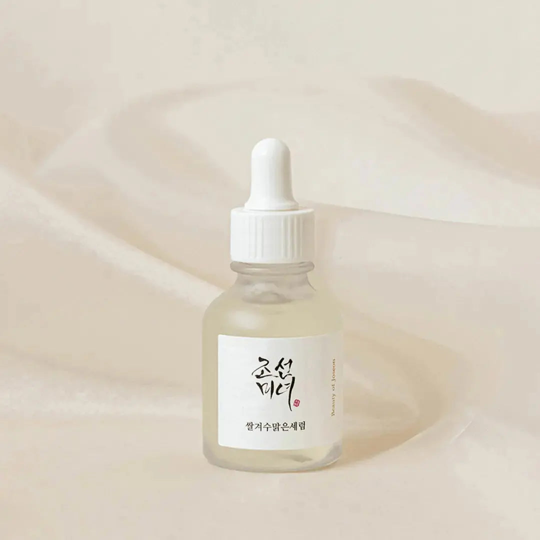 Beauty of Joseon Glow Deep Serum with Rice and Arbutin in a 30ml bottle, showcasing the serum's clear, smooth texture.
