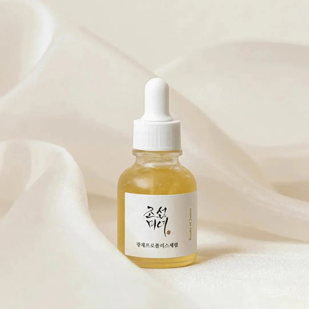Beauty of Joseon Glow Serum with Propolis and Niacinamide in a 30ml bottle, featuring clear packaging and a dropper cap.
