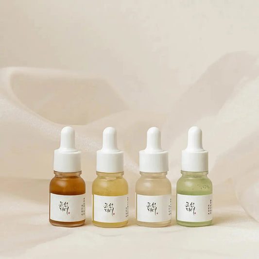 Beauty of Joseon Hanbang Serum Discovery Kit with sample sizes of skincare serums and traditional herbal ingredients, displayed in a white box.