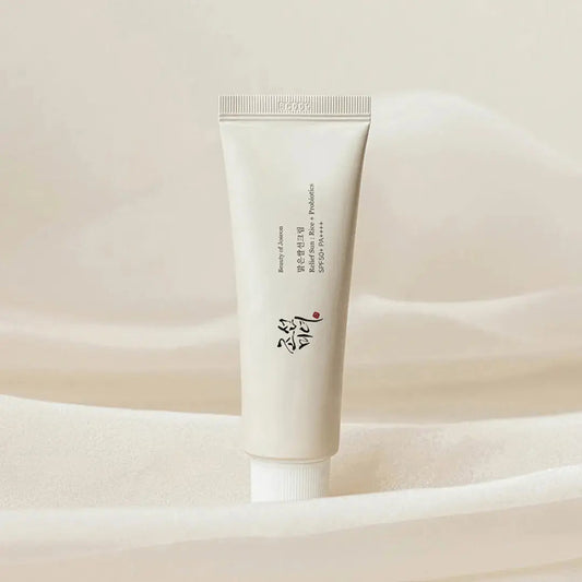 Beauty of Joseon Relief Sun Rice + Probiotics 50 ml bottle, featuring a skincare product with a white pump dispenser and minimalist design.