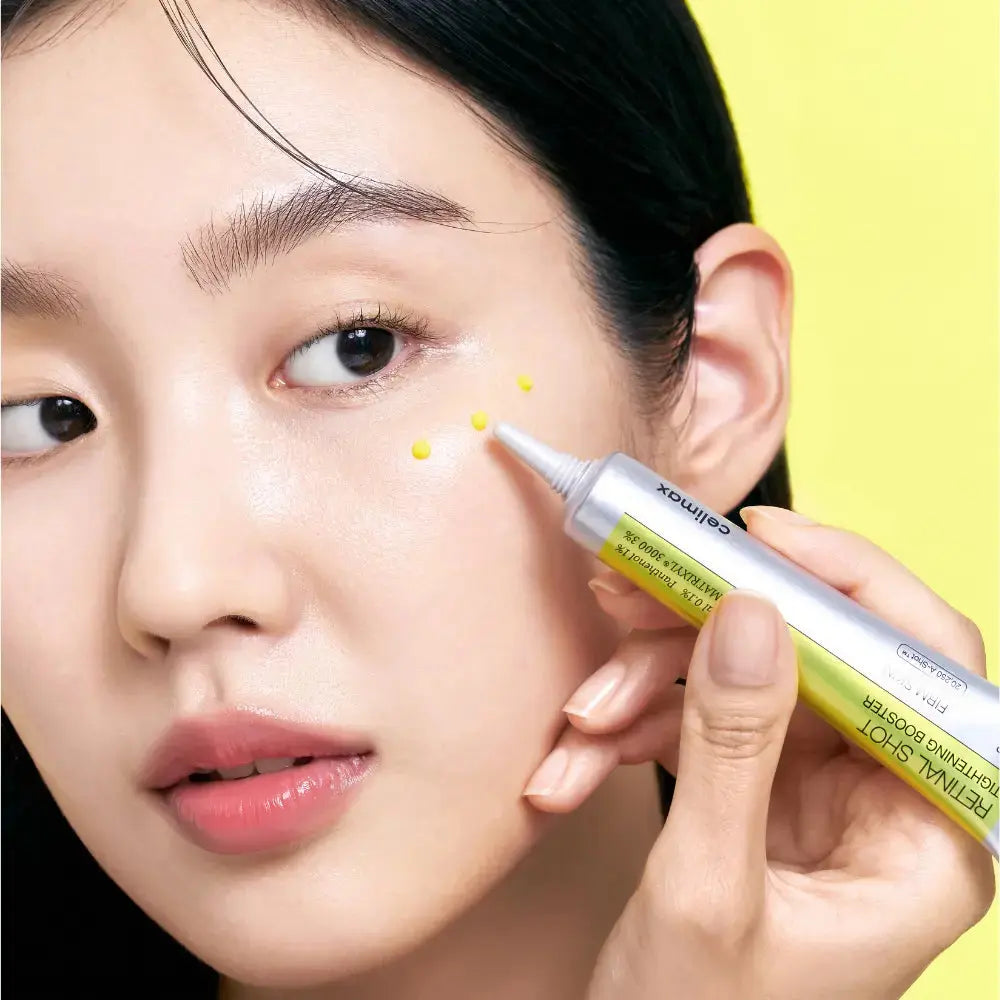 CELIMAX The Vita-A Retinol Shot Tightening Booster serum in a 15ml bottle, designed to improve skin firmness and reduce fine lines.
