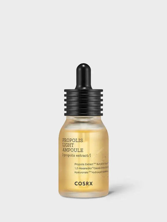 COSRX Full Fit Propolis Light Ampule 30 ml, a clear serum bottle with a white and green label, designed for skincare.