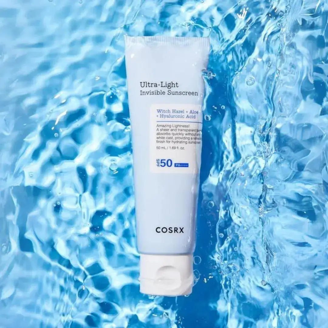 COSRX Ultra Light Invisible Sunscreen 50 ml in a clear tube with a white cap, showing the lightweight, transparent formula.