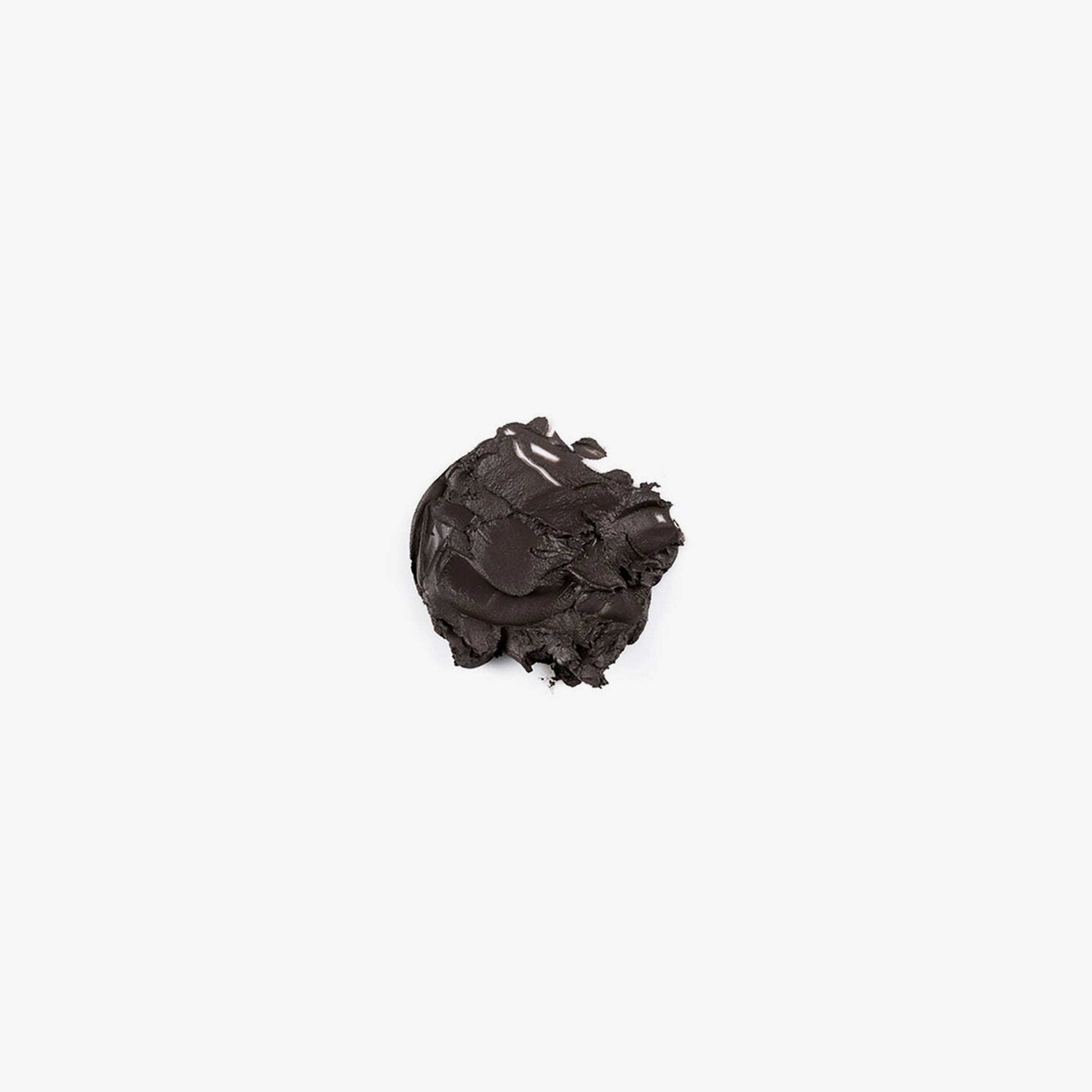 Swatch of Anastasia Beverly Hills DIPBROW® Pomade in Granite shade showing rich brow color and creamy texture.
