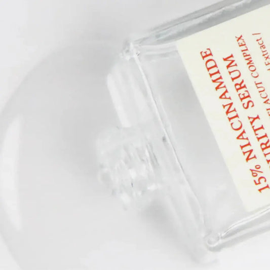 DR ALTHEA 15% Niacinamide Purity Serum 30ml bottle shown, highlighting clear packaging and product label.
