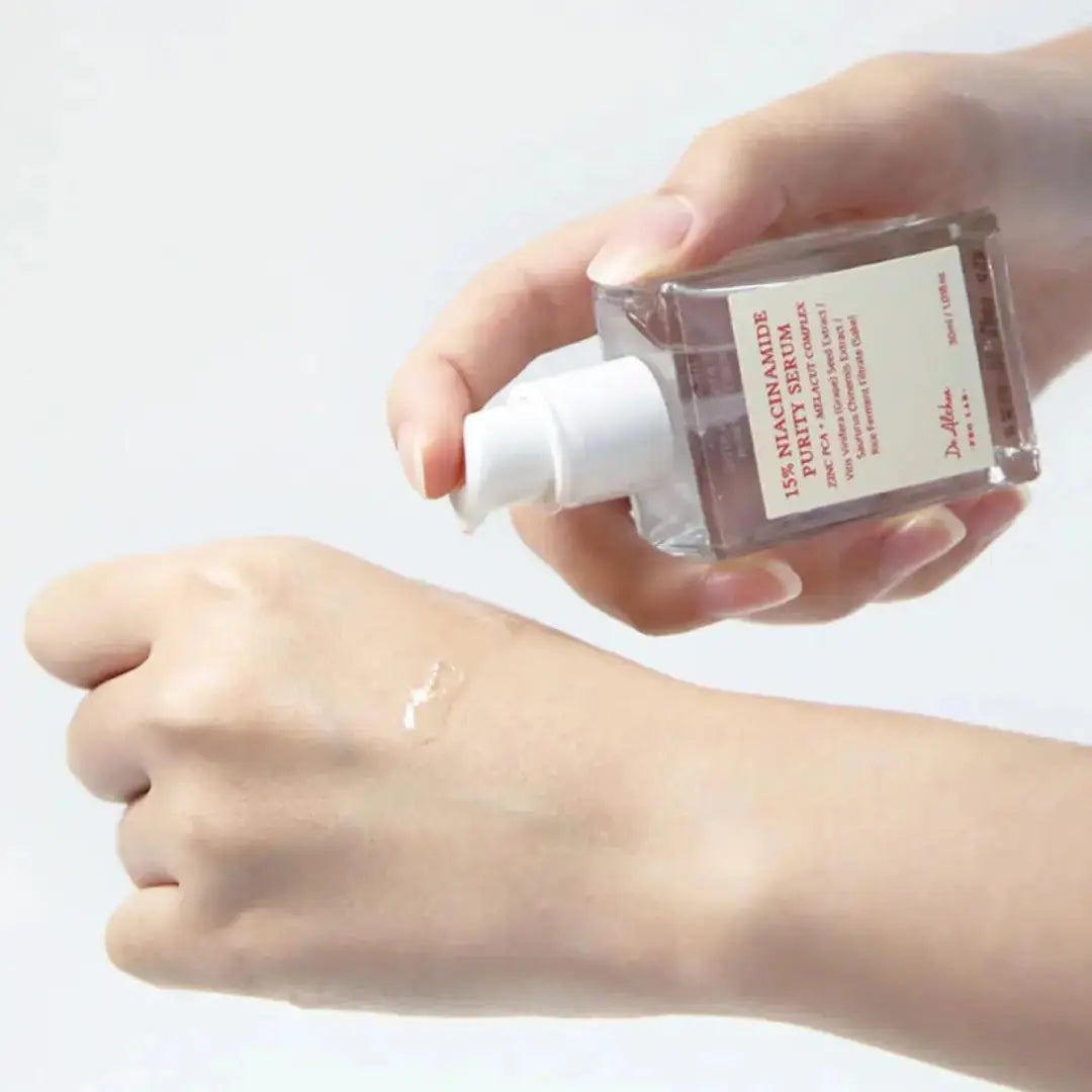DR ALTHEA 15% Niacinamide Purity Serum in a 30 ml bottle, showcasing the sleek packaging of the skincare product.