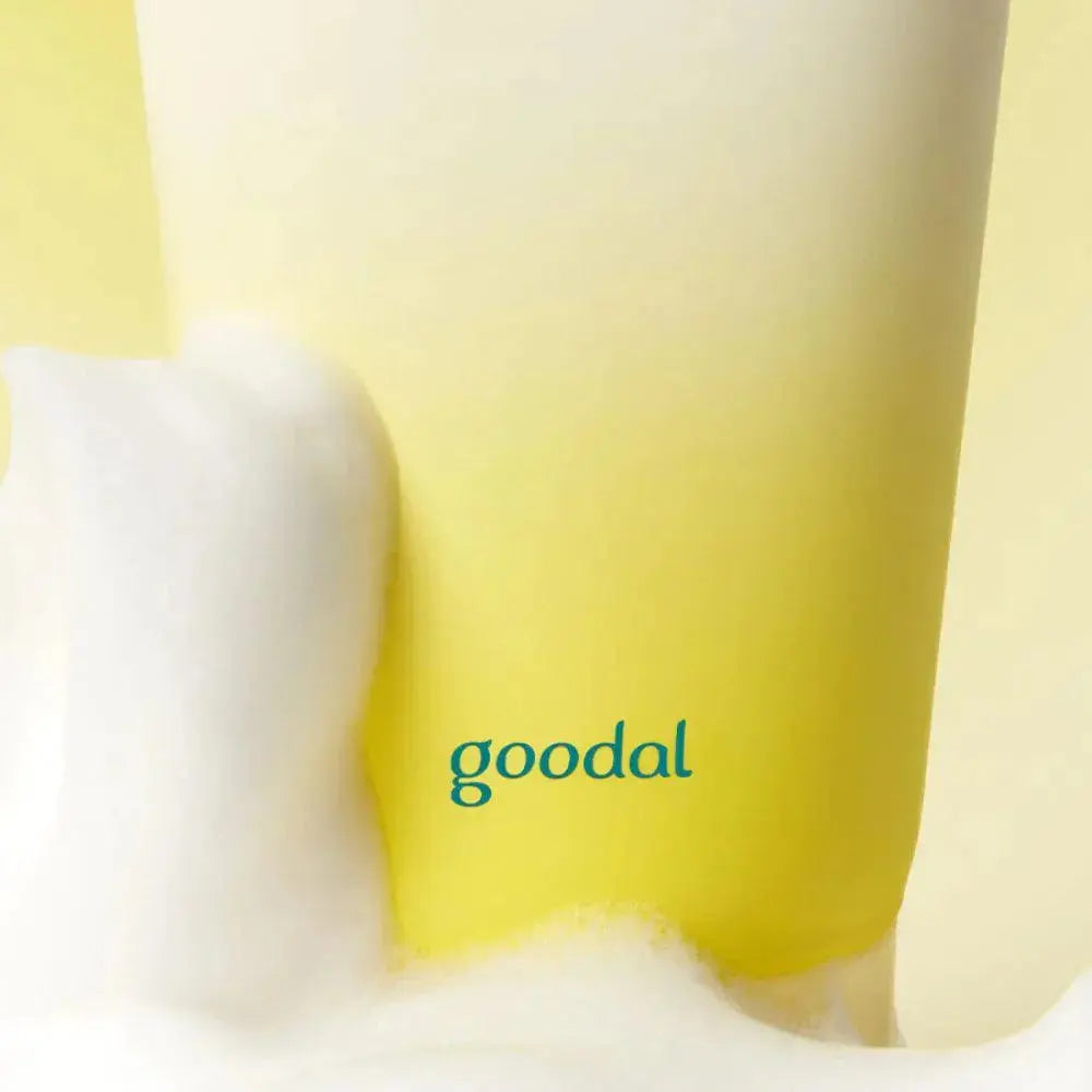 GOODAL Green Tangerine Vita C Cleansing Foam in a 150ml tube, featuring vibrant citrus packaging and a creamy foam texture
