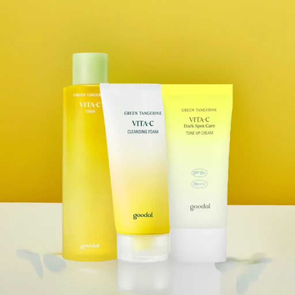 Goodal toner, cleansing foam, and cream set with bottles and jars of skincare products arranged on a white background.