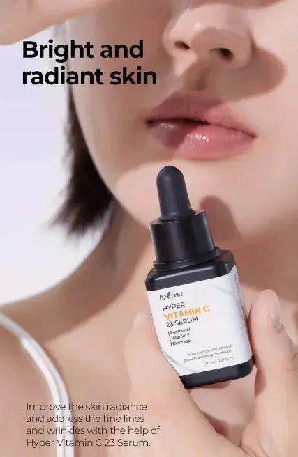 ISNTREE Hyper Vitamin C 23 Serum in a 20ml bottle, featuring bright orange packaging and dropper for skincare application.