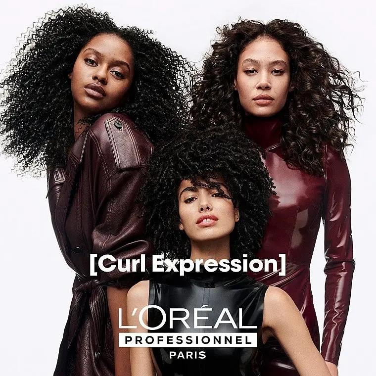 L'OREAL PROFESSIONNEL Curl Expression Moisturizing Cleansing Cream Shampoo bottle, 300ml, with curly hair on label.