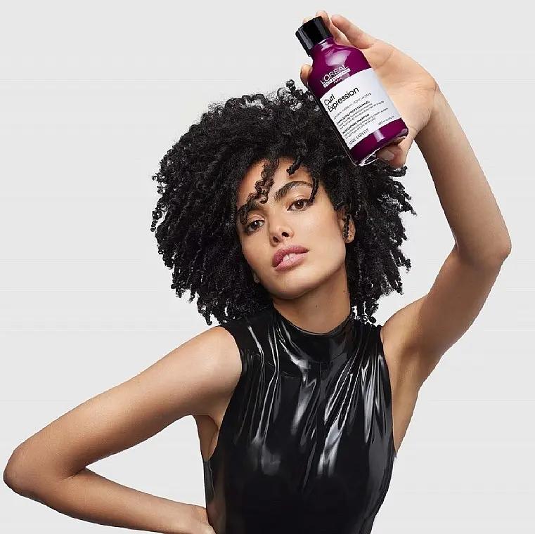 L'OREAL PROFESSIONNEL Curl Expression moisturizing cleansing cream shampoo in 300ml bottle with curly hair on the label