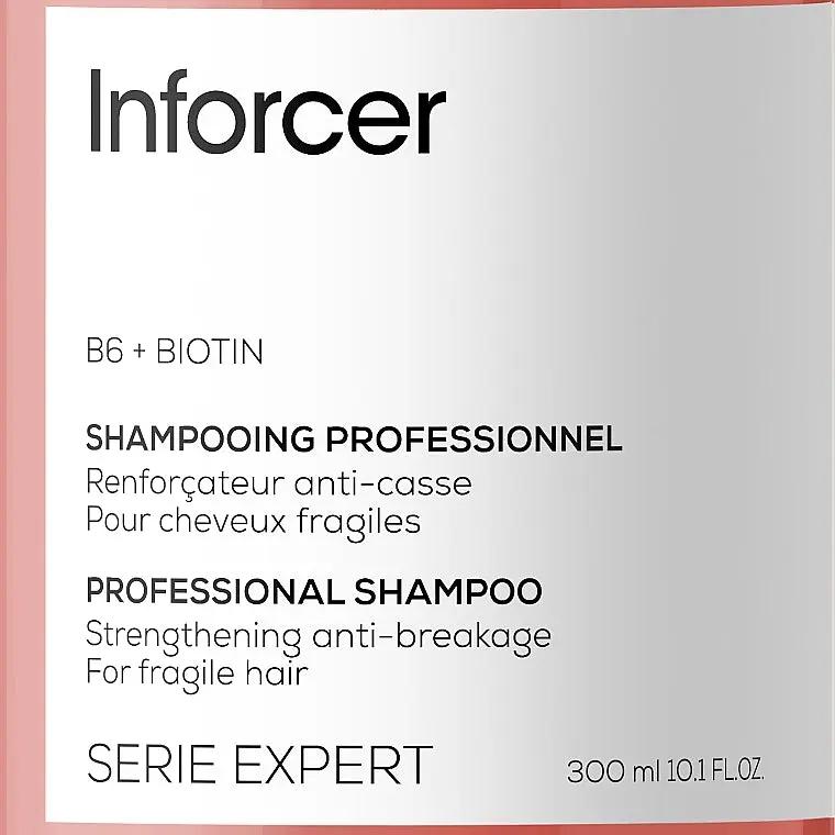 L'OREAL PROFESSIONNEL Inforcer strengthening shampoo bottle, 300 ml, designed to fortify and protect hair.