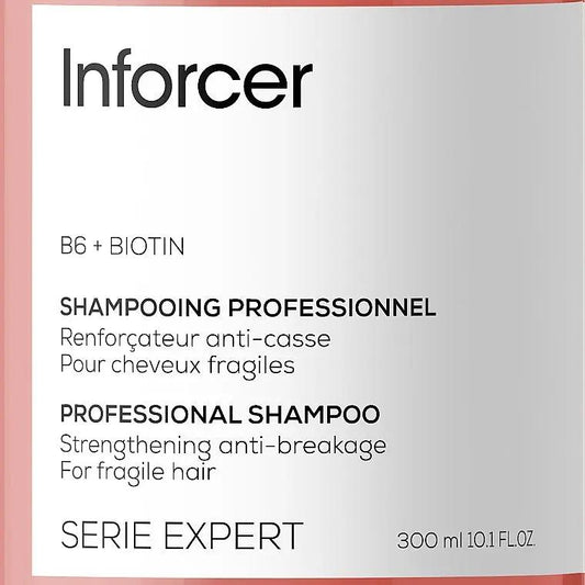 L'OREAL PROFESSIONNEL Inforcer strengthening shampoo bottle, 300 ml, designed to fortify and protect hair.