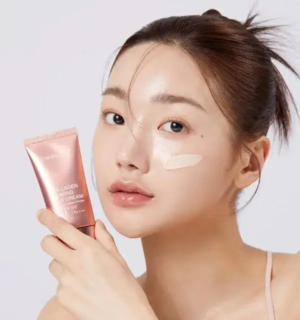 Medicube Collagen Firming Sun Cream in a 50ml tube, showing the packaging for skincare and sun protection.