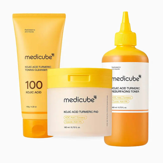 Medicube Kojic Acid Turmeric Brightening Skincare Set with cleanser, toner, and pads for even skin tone and radiance.