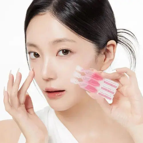 Medicube PDRN Pink One Day Serum Set with 10 vials, 1.5ml each, featuring skincare serum bottles in a display image.