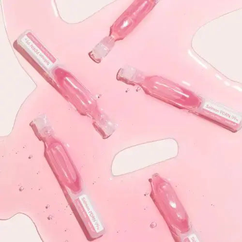 Medicube PDRN Pink One Day Serum Set with 10 bottles of 1.5ml each, featuring the skincare product in a set arrangement.
