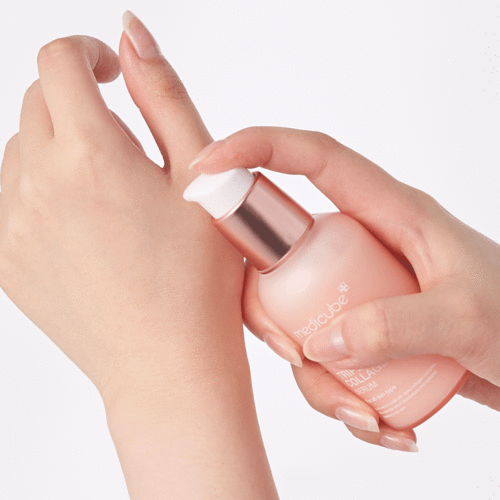 Medicube Triple Collagen Serum 4.0 in a 55ml bottle, featuring clear serum with a dropper applicator for skin hydration and firmness