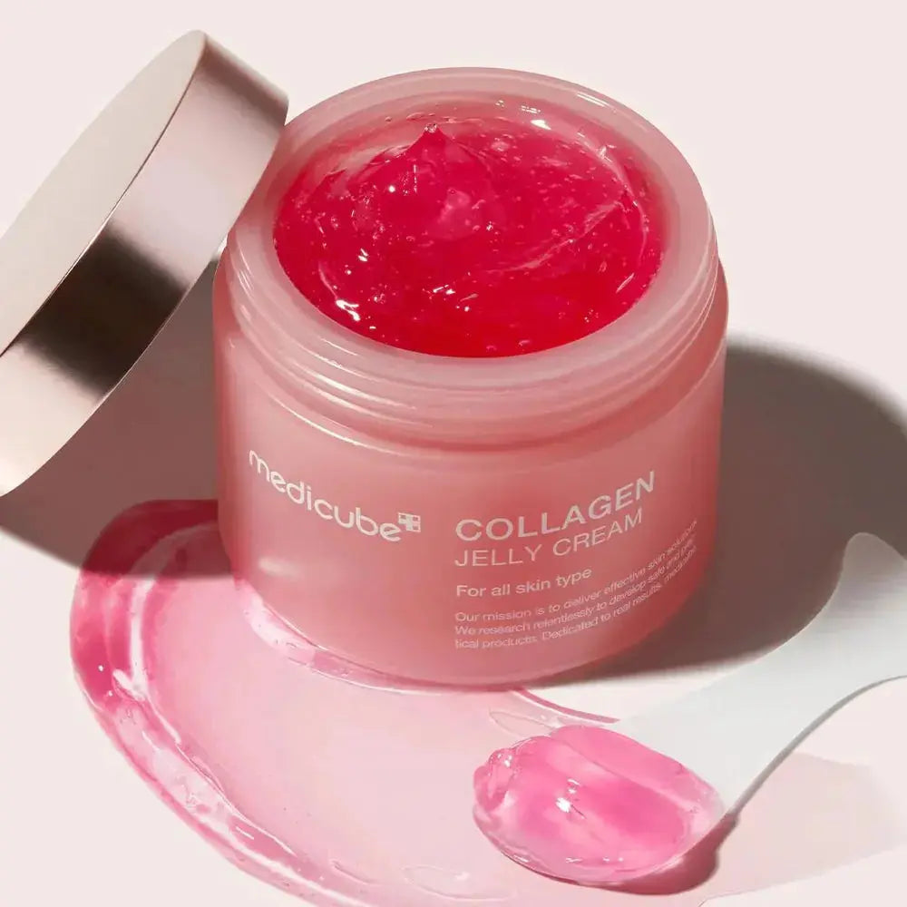 Medicube Ultimate Glow Booster Kit with skincare bottles and applicators for radiant skin care.