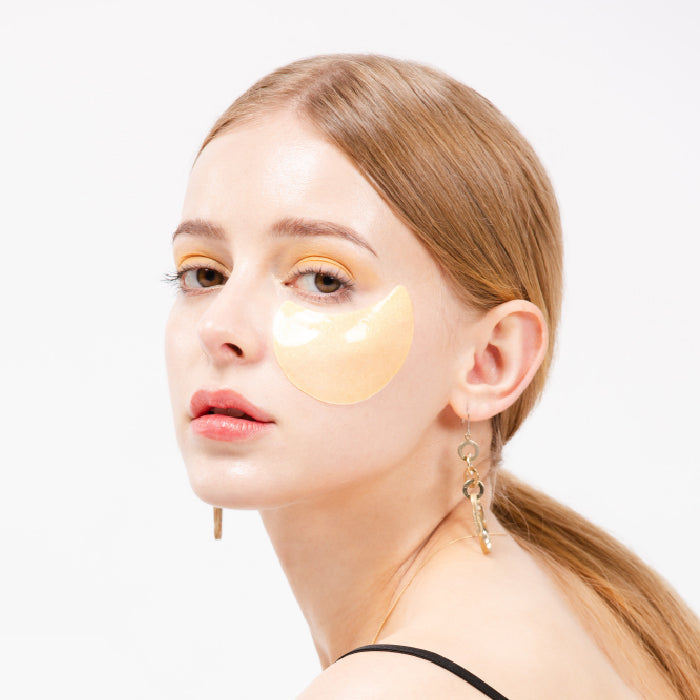 K-SECRET Vitamin C eye gel patches showing two soothing, translucent patches designed to reduce puffiness and brighten the under-eye area.